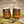 Load image into Gallery viewer, Woodsman limited edition laser etched nordic design soy candles in amber jars with gold lids on mossy log
